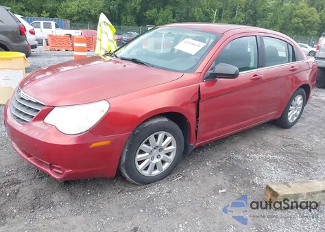 2010 Chrysler Sebring Touring z USA, uszkodzony, nr VIN 1C3CC4FB5AN229903